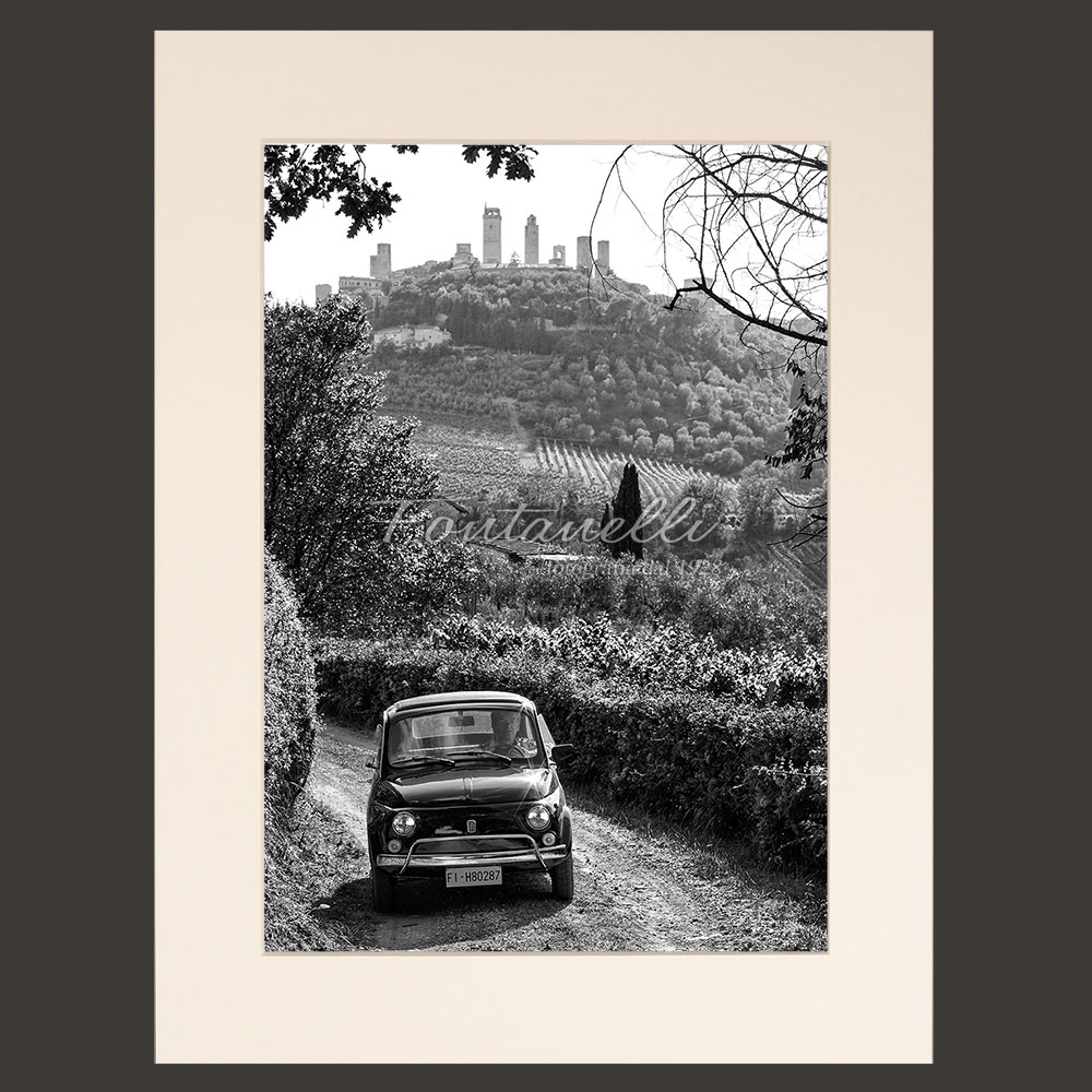 The countryside around San Gimignano Tuscany with Fiat 500