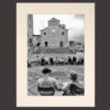 Black and white photo painters in Piazza Duomo San Gimignano Tuscany