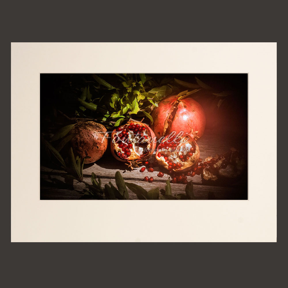 Still life photos. Pomegranates, autumn rubies, Tuscany